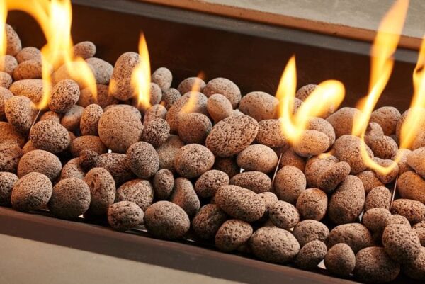 Stock Image - The Outdoor GreatRoom - Tumbled Lava Rock The Outdoor Greatroom Company Media - Stove Depot and Chimney Works